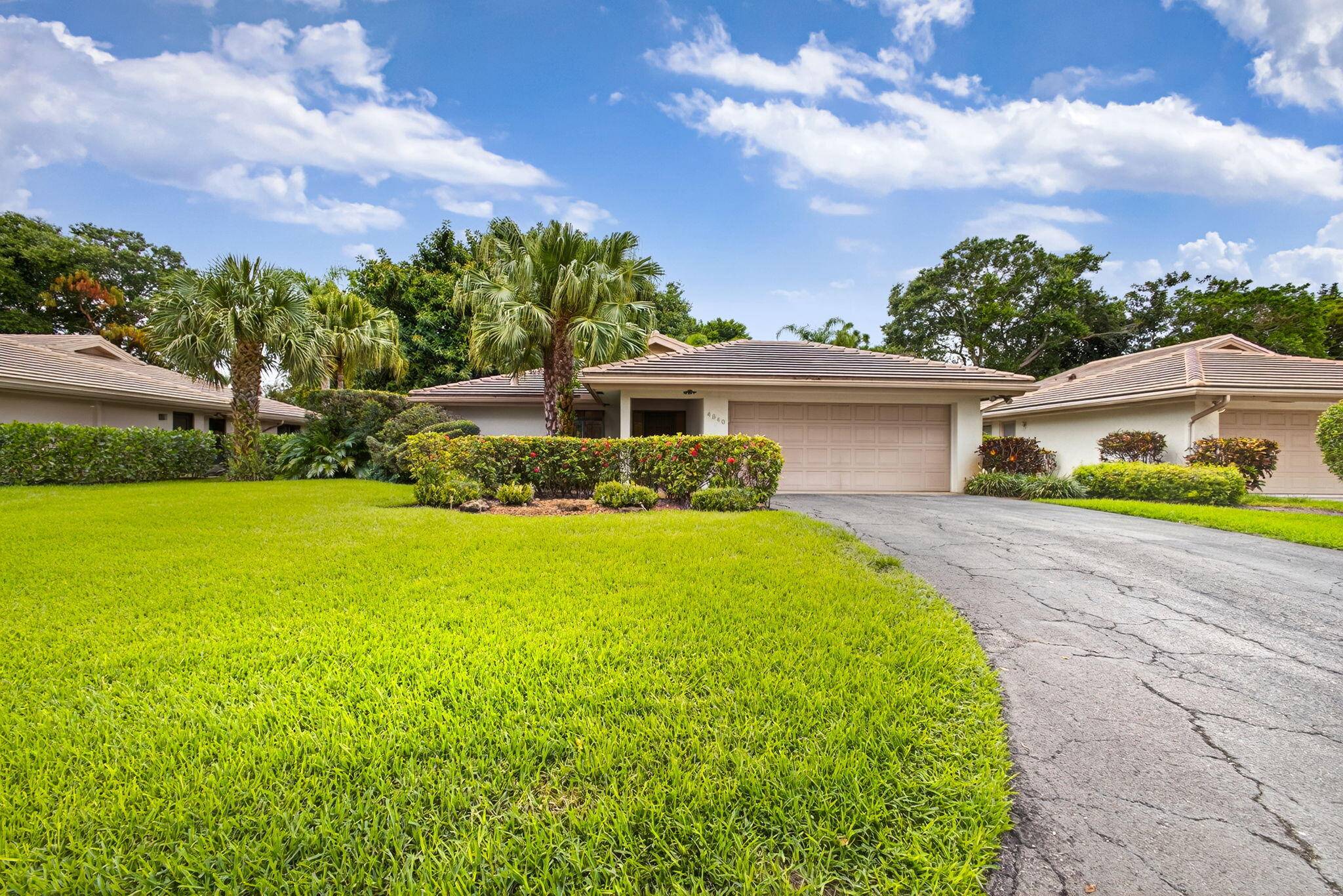 Charming ranch style home nestled in the VILLAS OF PINETREE within the prestigious Pine Tree Golf Club no equity fees and no club membership required !