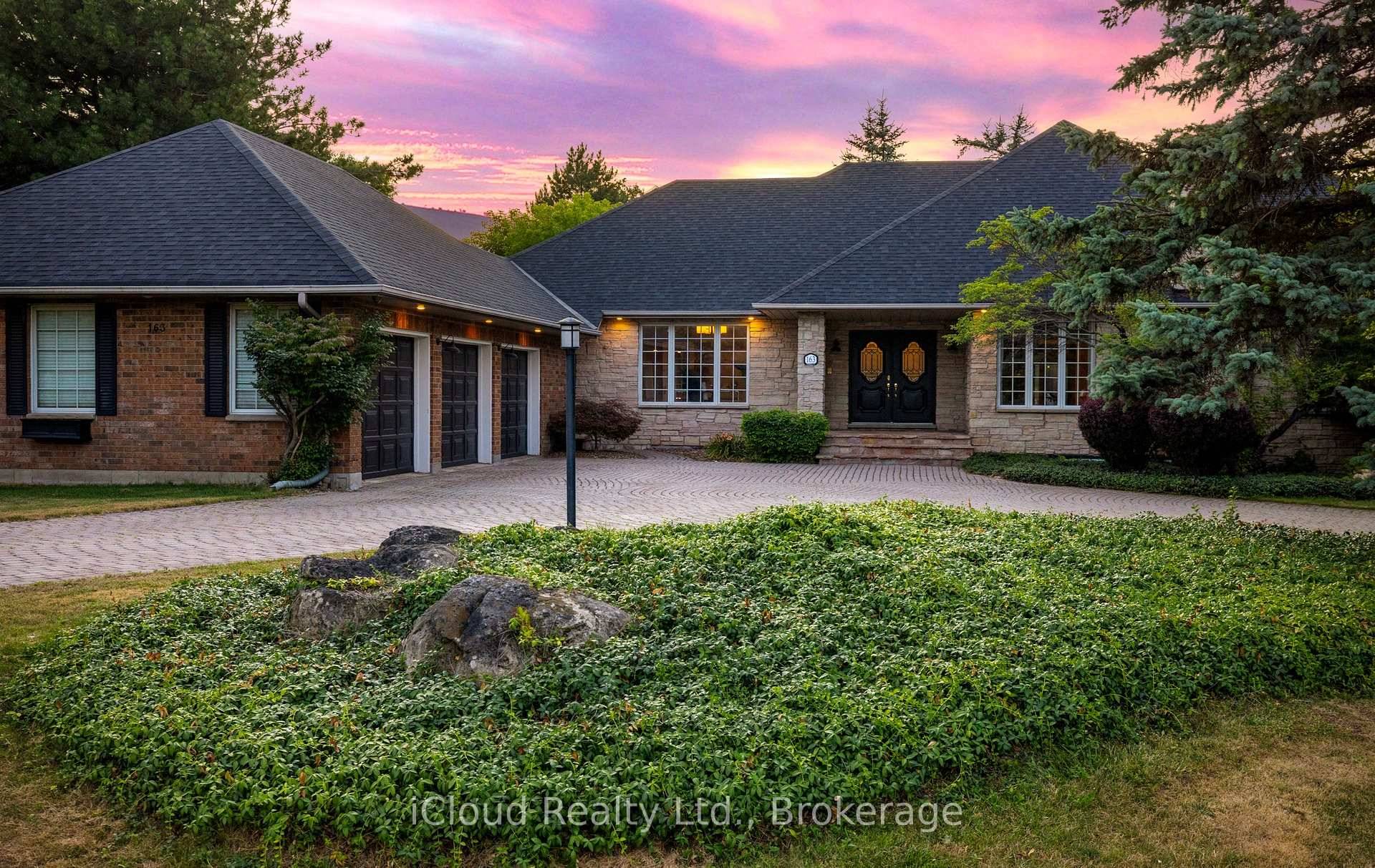 Set amid a community of upscale estate properties, this refined residence offers over 6, 500 sq ft of luxurious living on a 1.