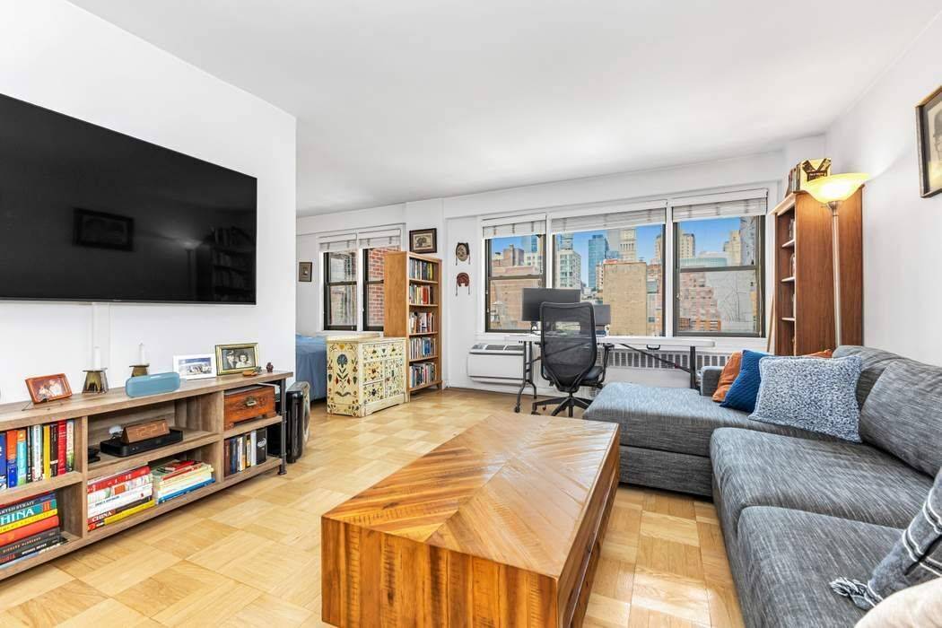 Perched on a high floor with rare, wide open western views, this beautifully renovated alcove studio is a true standout bathed in natural light all day and offering exceptional flexibility ...