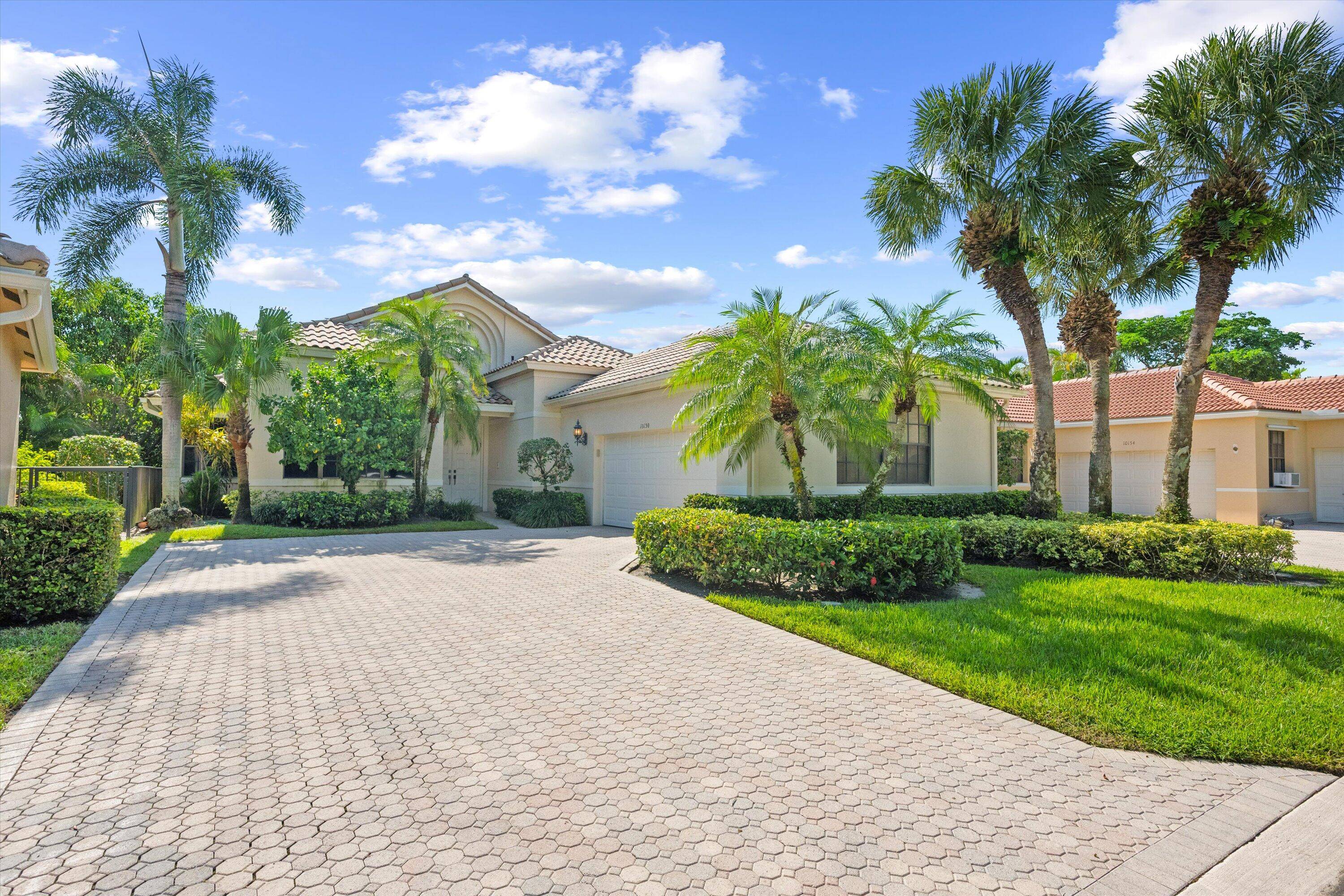 Welcome to this lovely and unique 3 bedroom, 3 bathroom home located in the Dover neighborhood of Wycliffe Golf Country Club.