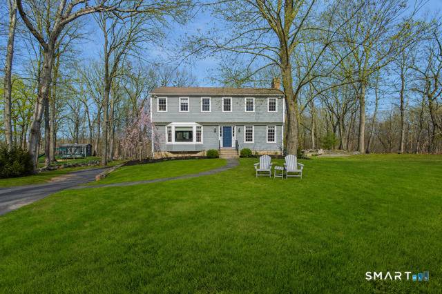 Welcome home ! This charming and updated 4 BR 2 1 2 bath colonial is sited on 2 acres of property on a cul de sac street in a true ...