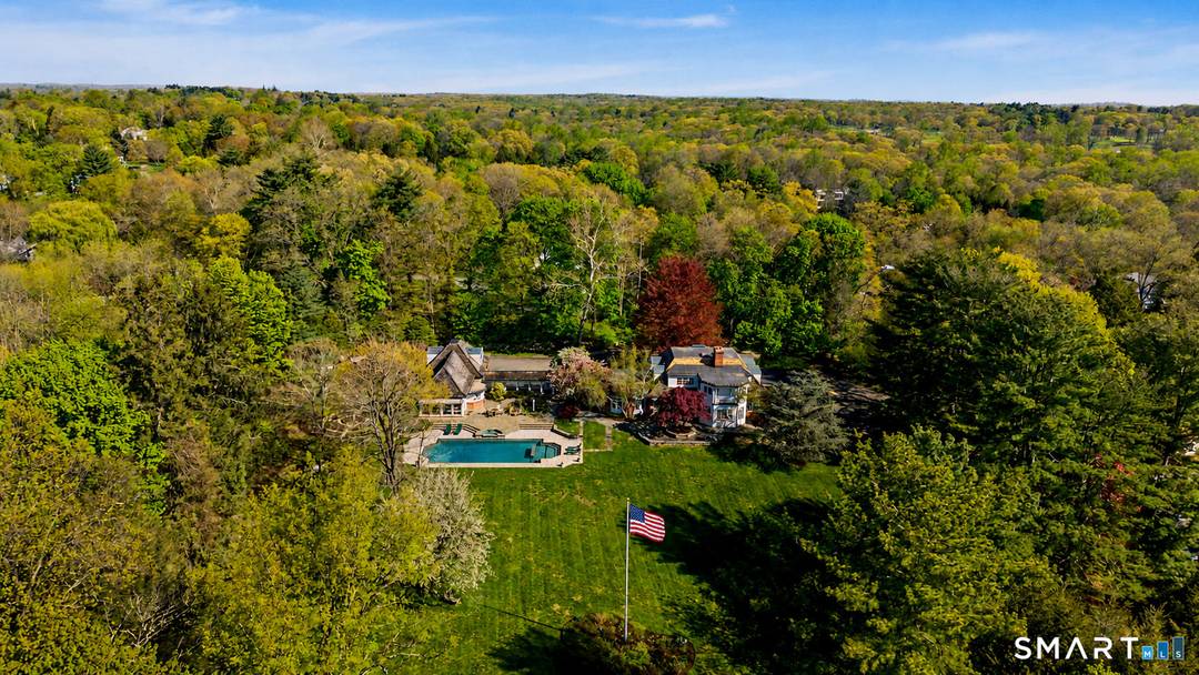 Set on over four and a half acres of private, level grounds in one of New Canaan's most sought after locations, this exceptional estate offers a rare combination of scale, ...