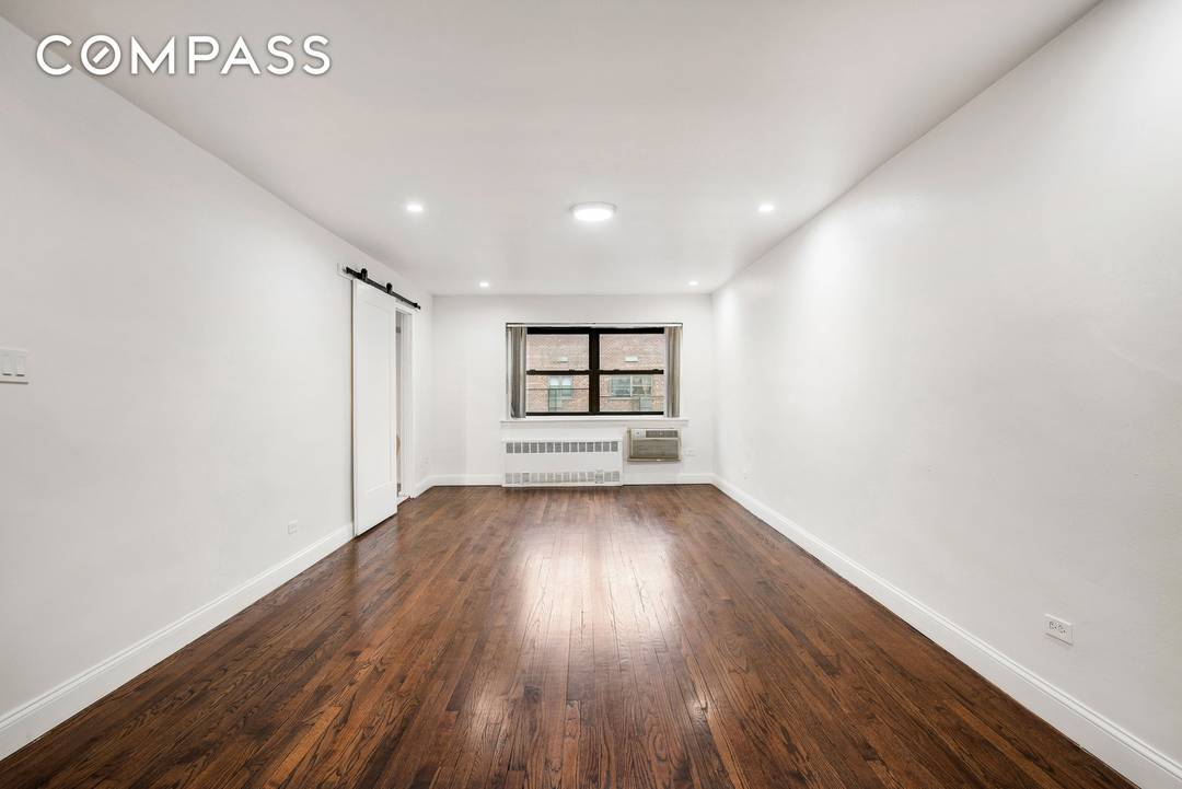 57 10 Junction Boulevard, Unit 6J is a top floor, corner three bedroom, one and a half bath residence offering space, light, and long term flexibility in the heart of ...