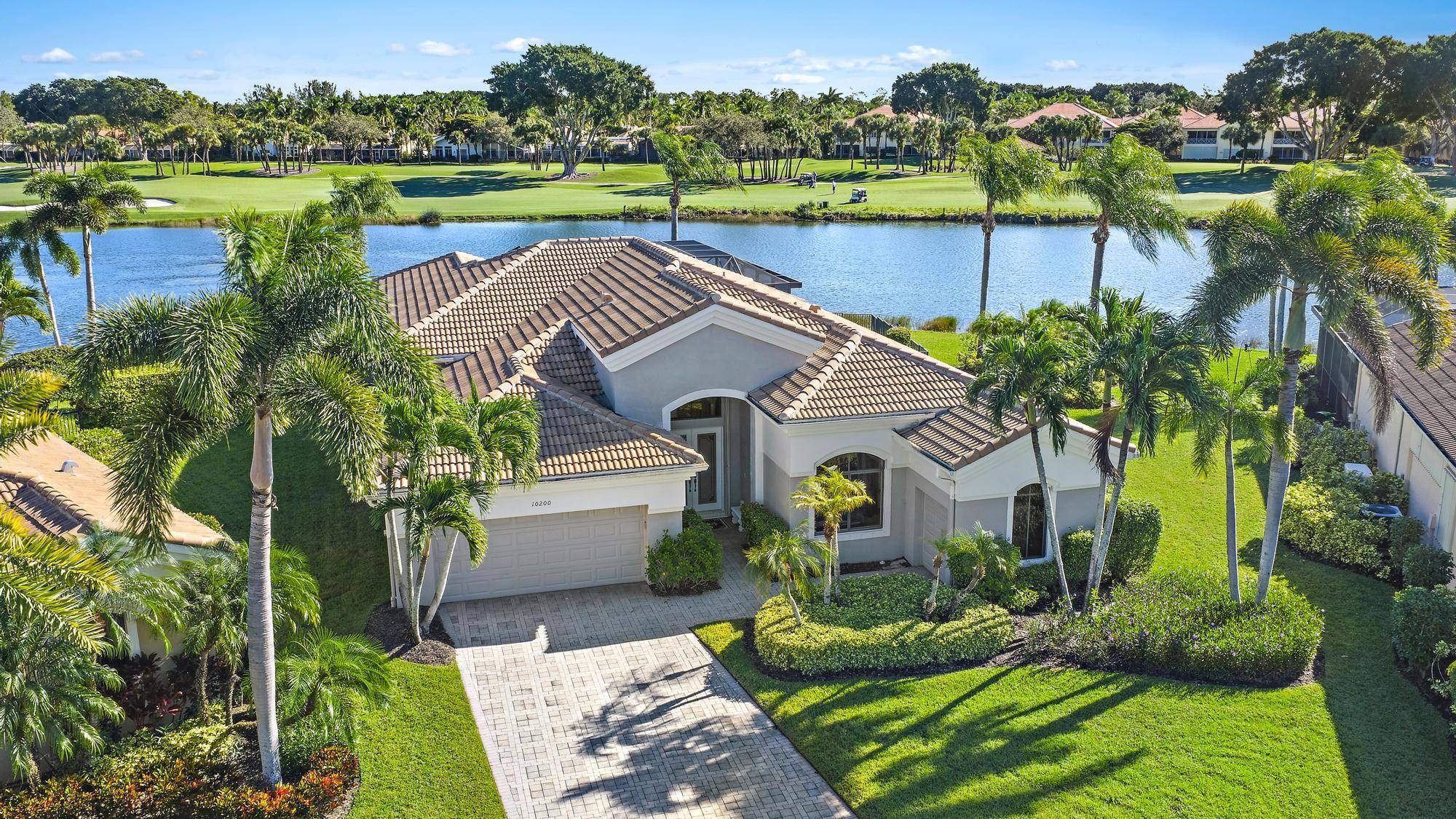 IMMEDIATE PREMIER GOLF MEMBERSHIP AVAILABLE with the purchase of this extraordinary home perfectly situated on one of the most coveted lots in Blue Heron Bay and all of Ibis.