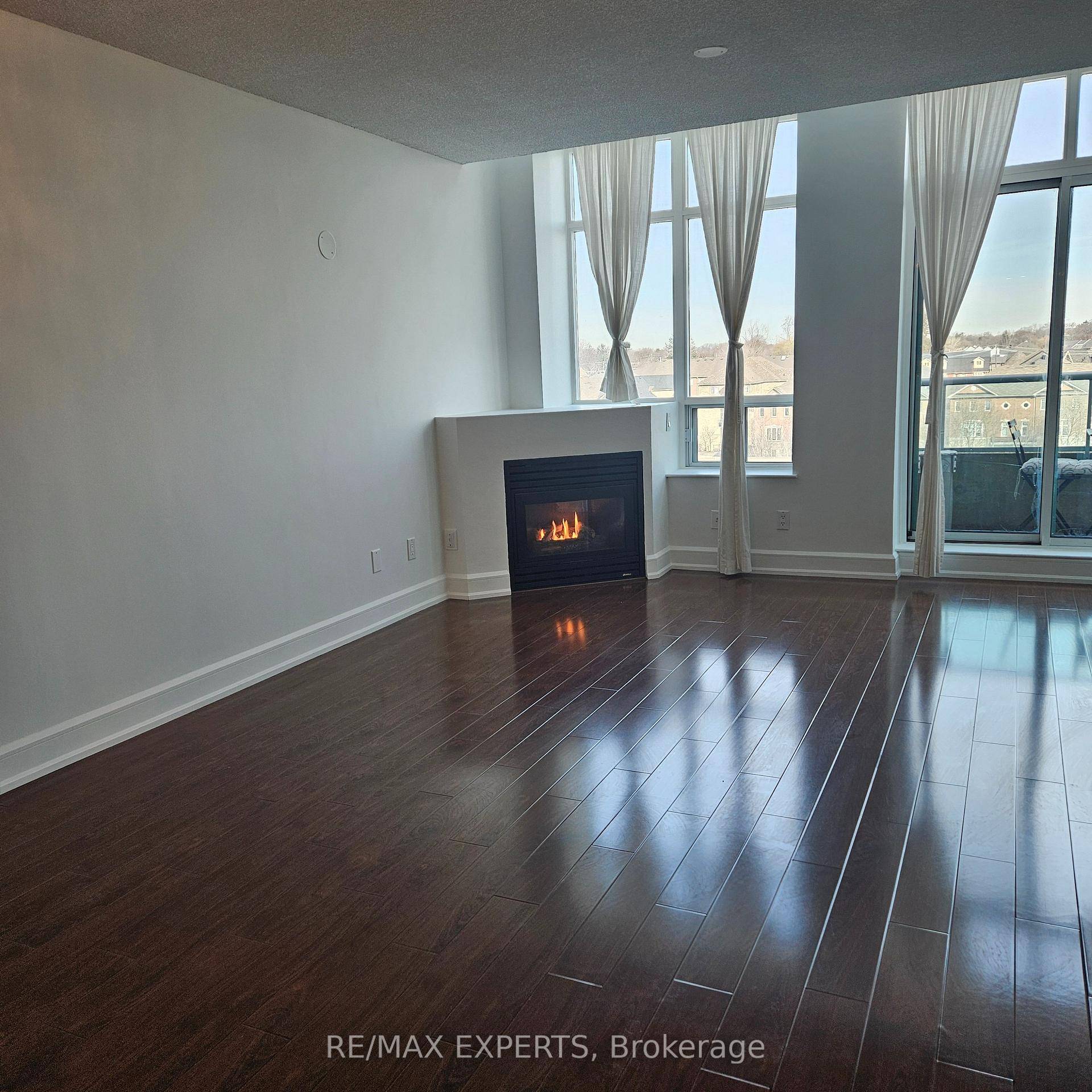 Look No Further ! This Freshly Painted, Spacious 2 Storey Loft With 17 Foot Ceilings In Highly Sought After Mystic Pointe Boasts Over 900 Sq.