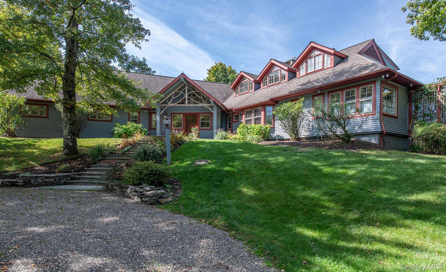 Nearly 30 secluded acres of rolling meadows and woodlands unfold into breathtaking panoramic views of the Catskill Mountains.