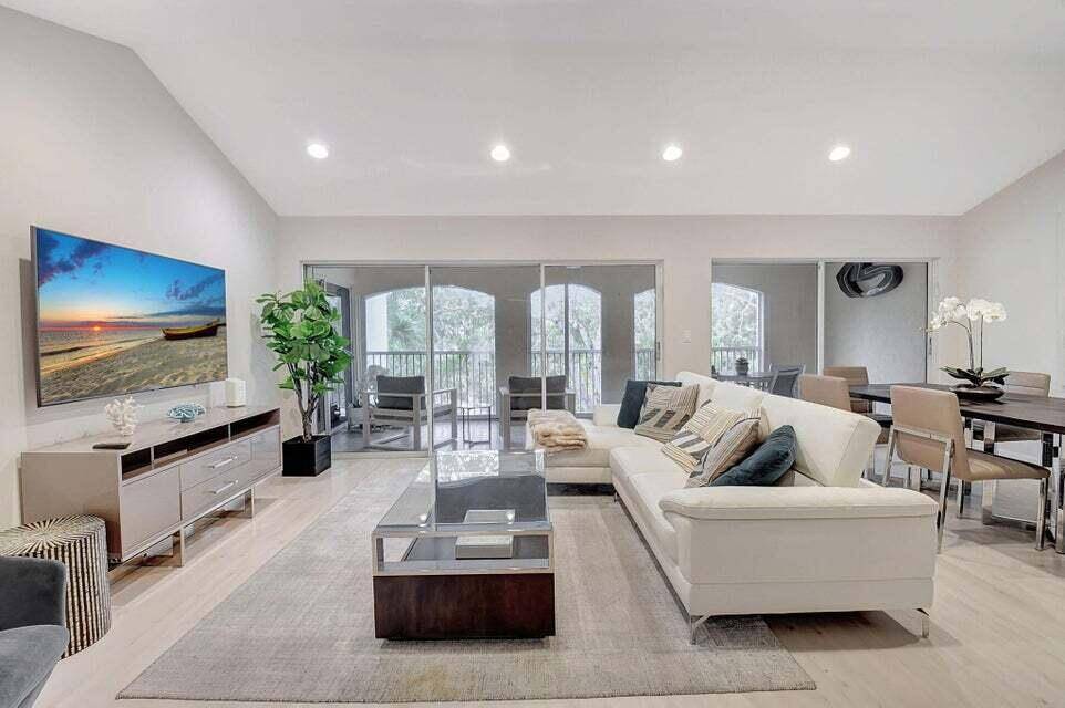 Enjoy the Florida lifestyle in this gorgeous 3rd floor condo in Boca Grove Country Club.