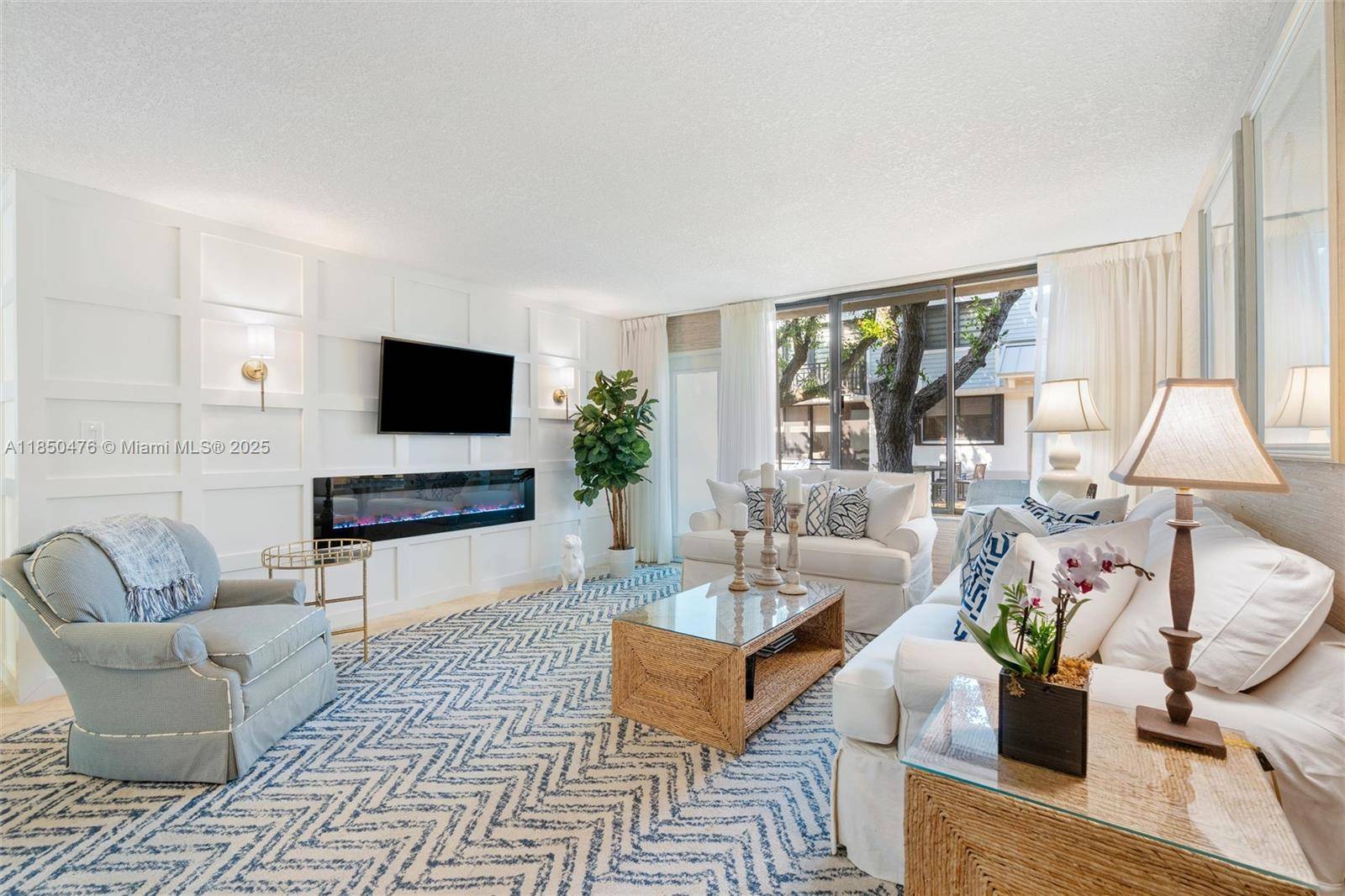 Furnished 2 BR Den or 3 BR 2 BA designer model at The Oceanage feels like a beach house and features a desirable first floor location with parking right outside ...