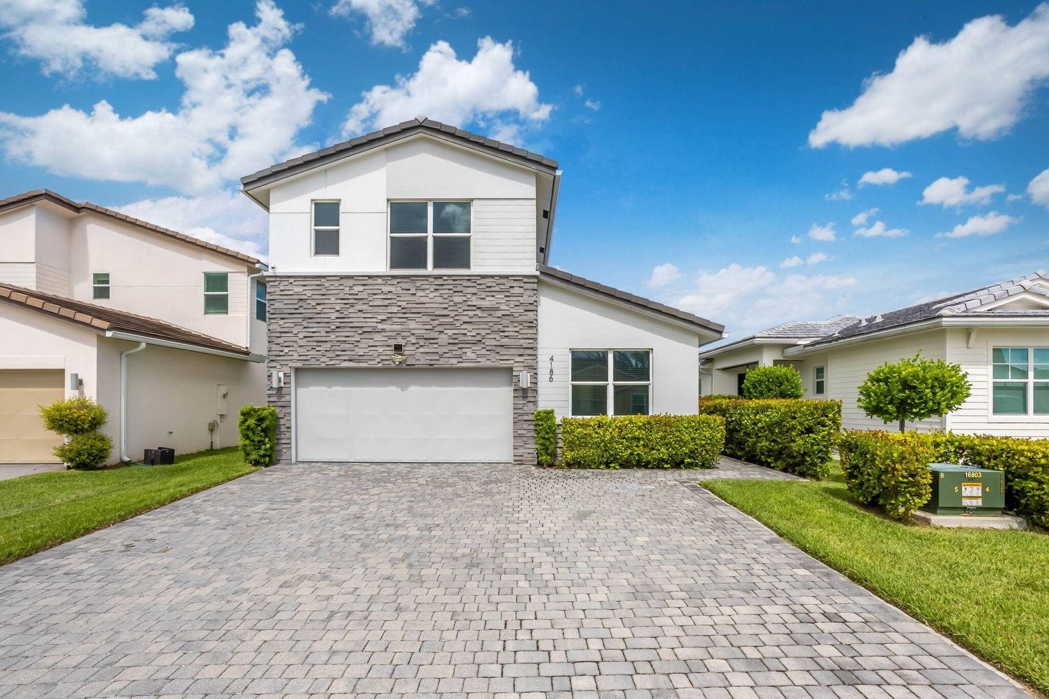 The desirable Cisne model features 4 BR, 3 BA, and a highly sought after dual Primary Suite layout.