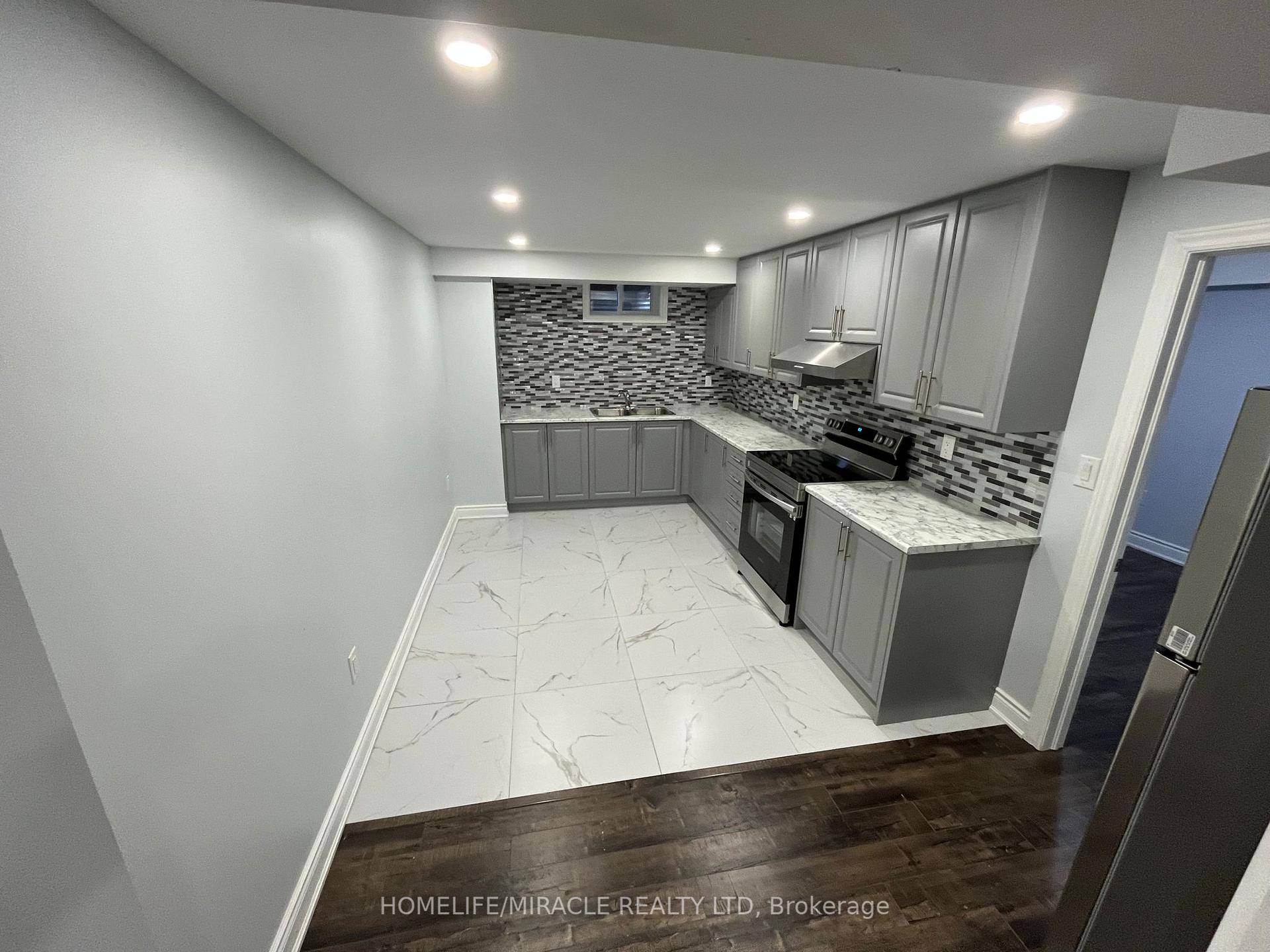 Welcome to this stunning basement apartment that has been recently renovated to perfection !