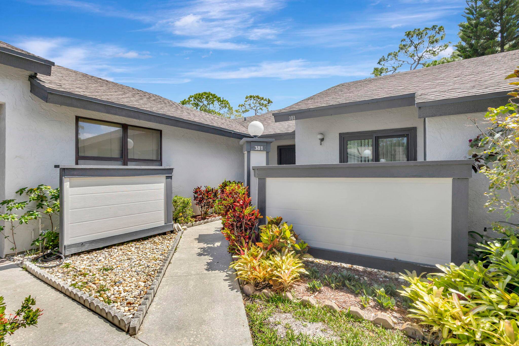 A Private Slice of Traditional Florida Living in Strathmore Community Welcome home to this charming two bedroom, two bath corner unit, tucked away in the tranquil, 55 Strathmore Community.