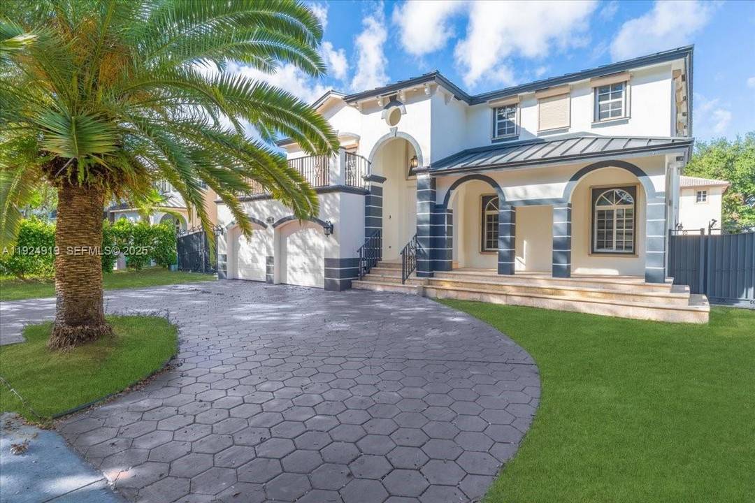 Welcome to this stunning residence located in the prestigious Royal Oaks community in Miami Lakes, one of the most desirable and secure neighborhoods in Miami Dade.