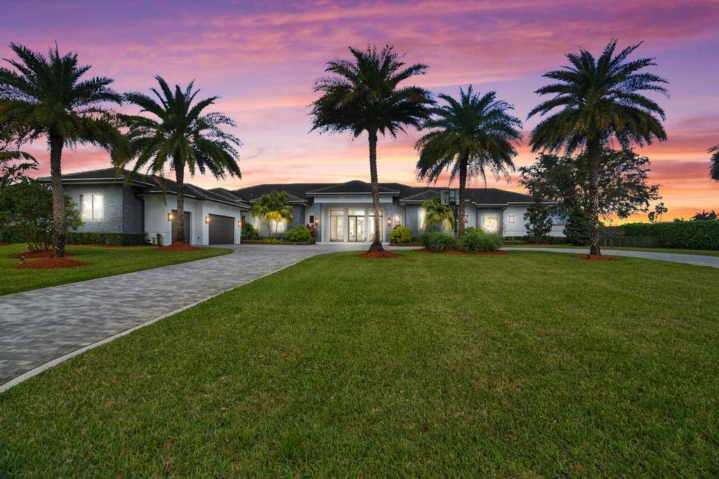 Sprawling, Modern, Contemporary 1 story like new home custom built in 2020 on 1 acre in Boca Raton.