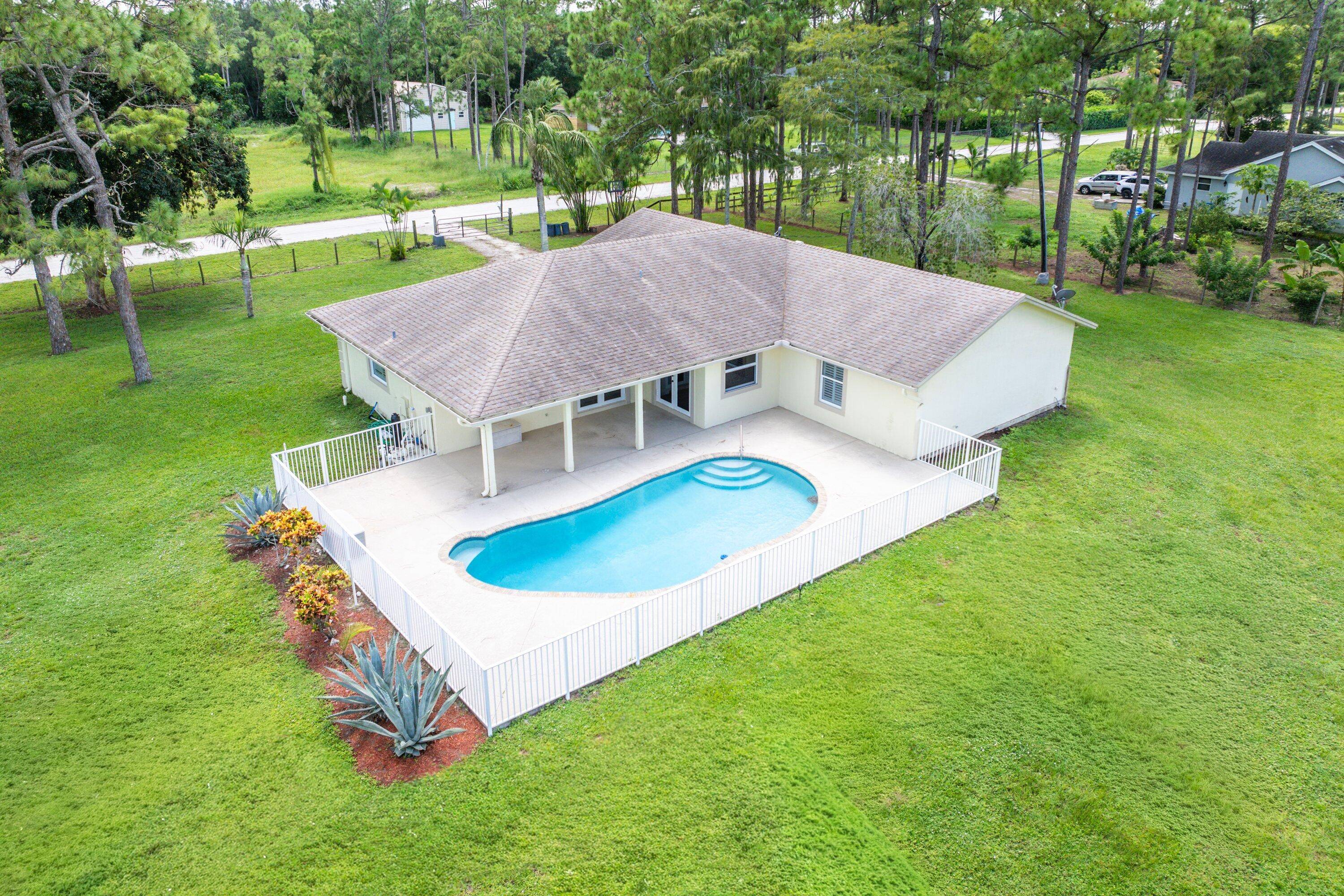 Welcome to this freshly remodeled 3 bedroom, 2 bathroom, 2 car garage pool home, perfectly situated on an expansive 1.