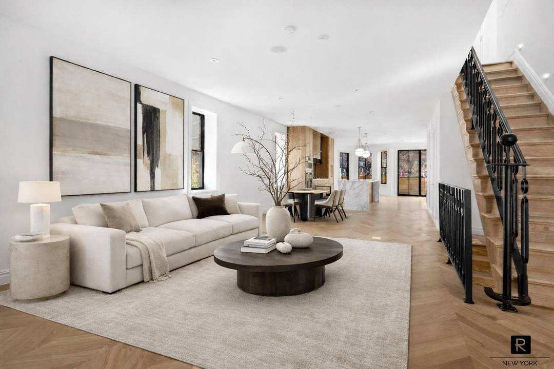 Stunning Two Family Townhouse, where timeless elegance meets modern luxury.