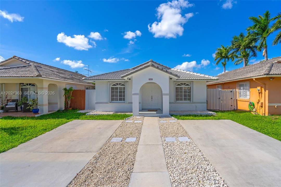Completely remodeled 3 bedroom, 2 bathroom home featuring brand new ceramic floors throughout, NEW ROOF, a modern kitchen with granite countertops, custom made closets, and upgraded finishes in every space.