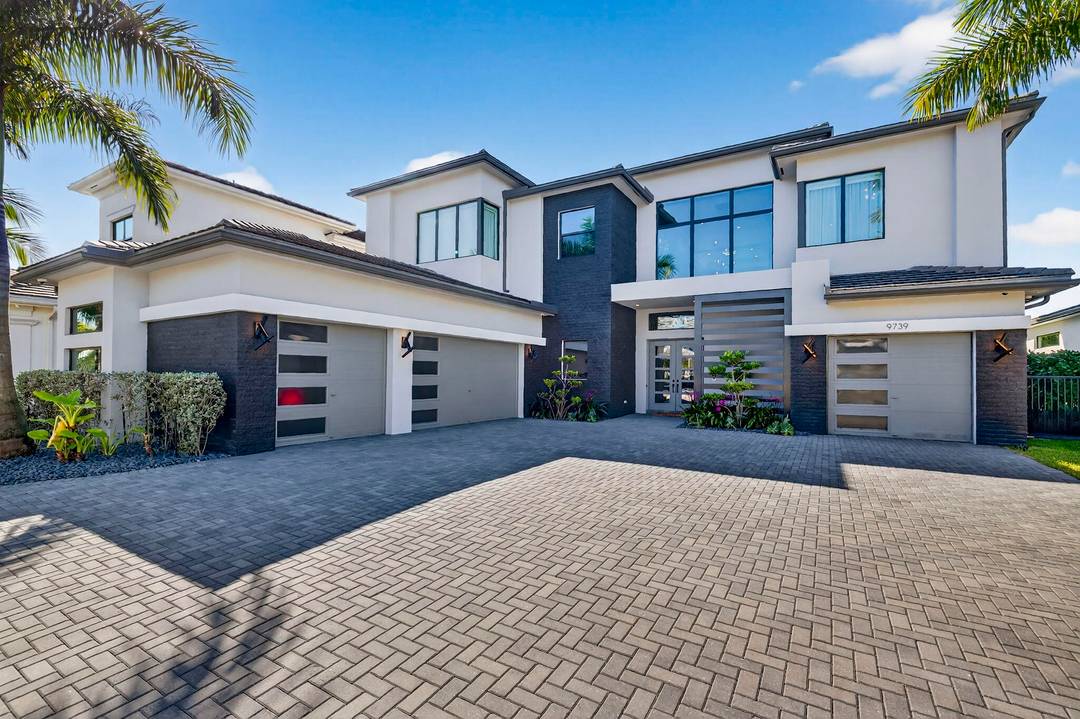 Located in Boca Bridges, one of the newest luxury communities, built in 2022, this exceptional estate blends modern elegance with resort style living.