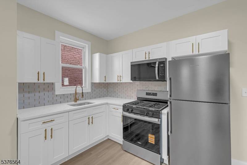 Welcome to 863 State St, a beautifully renovated 2 family home in a prime area of Perth Amboy, just off Route 440 and near the Outerbridge Crossing.