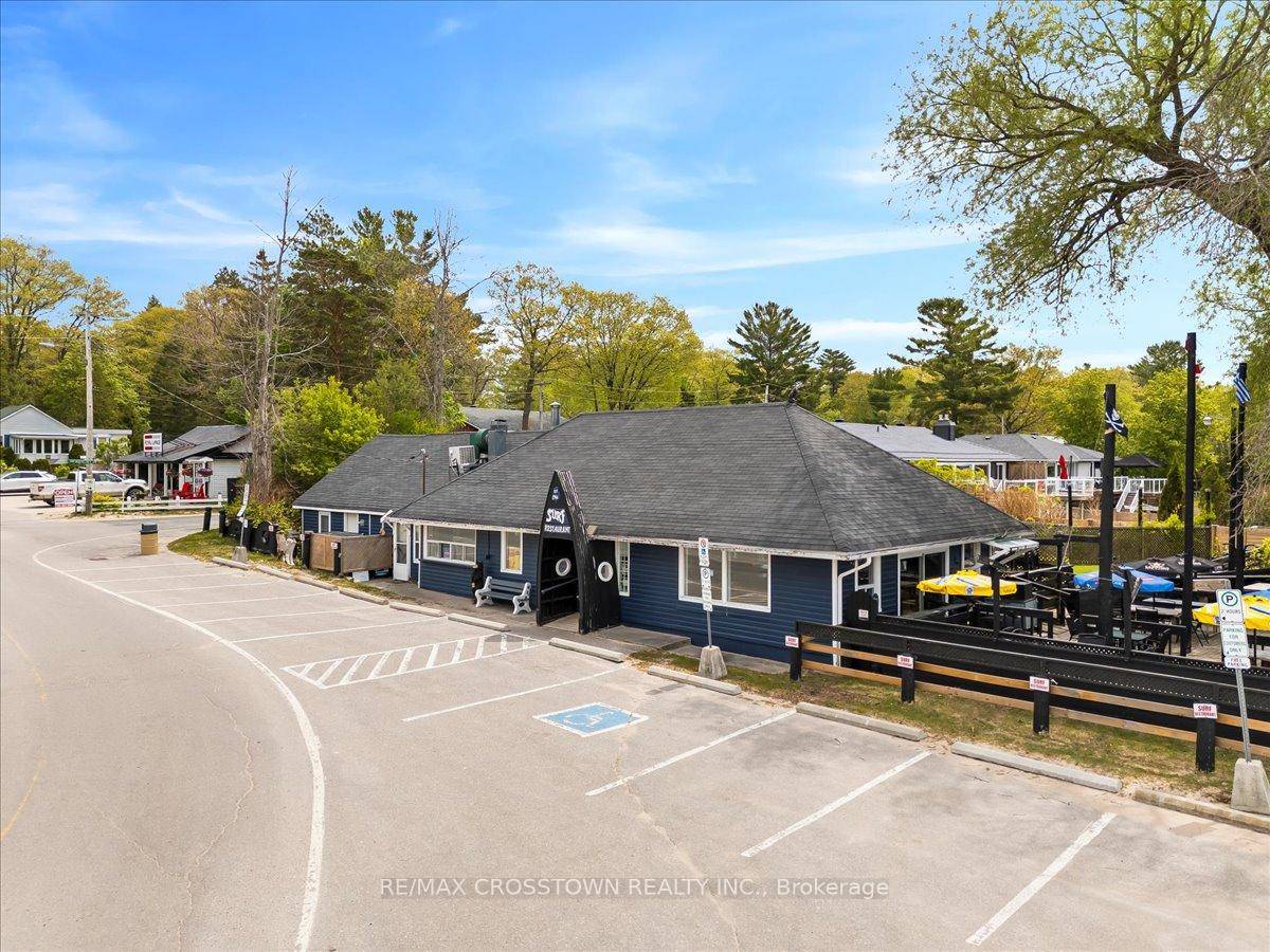 Rare opportunity to own a one of a kind waterfront property at 369 Balm Beach Rd W, ideally located on the sandy shores of Georgian Bay.