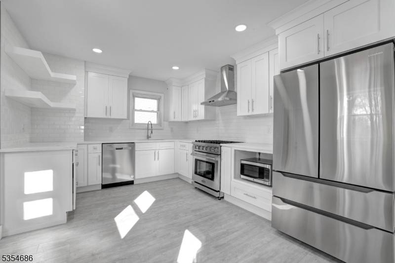 Come see this stunning fully renovated 4 bedroom, 1.