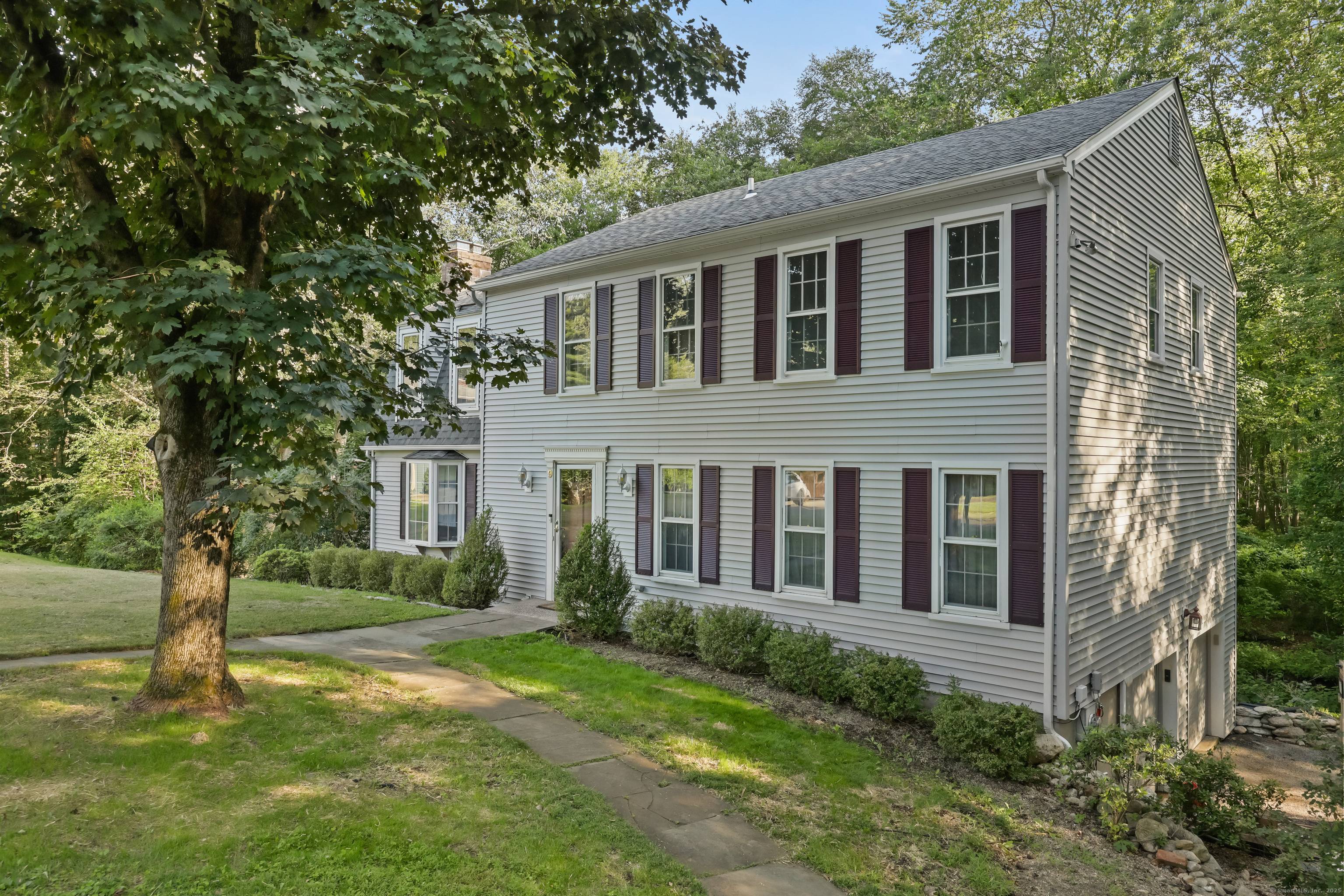 Colonial in one of Norwalk's most desirable and serene neighborhoods, this spacious 4 bedroom, 2.