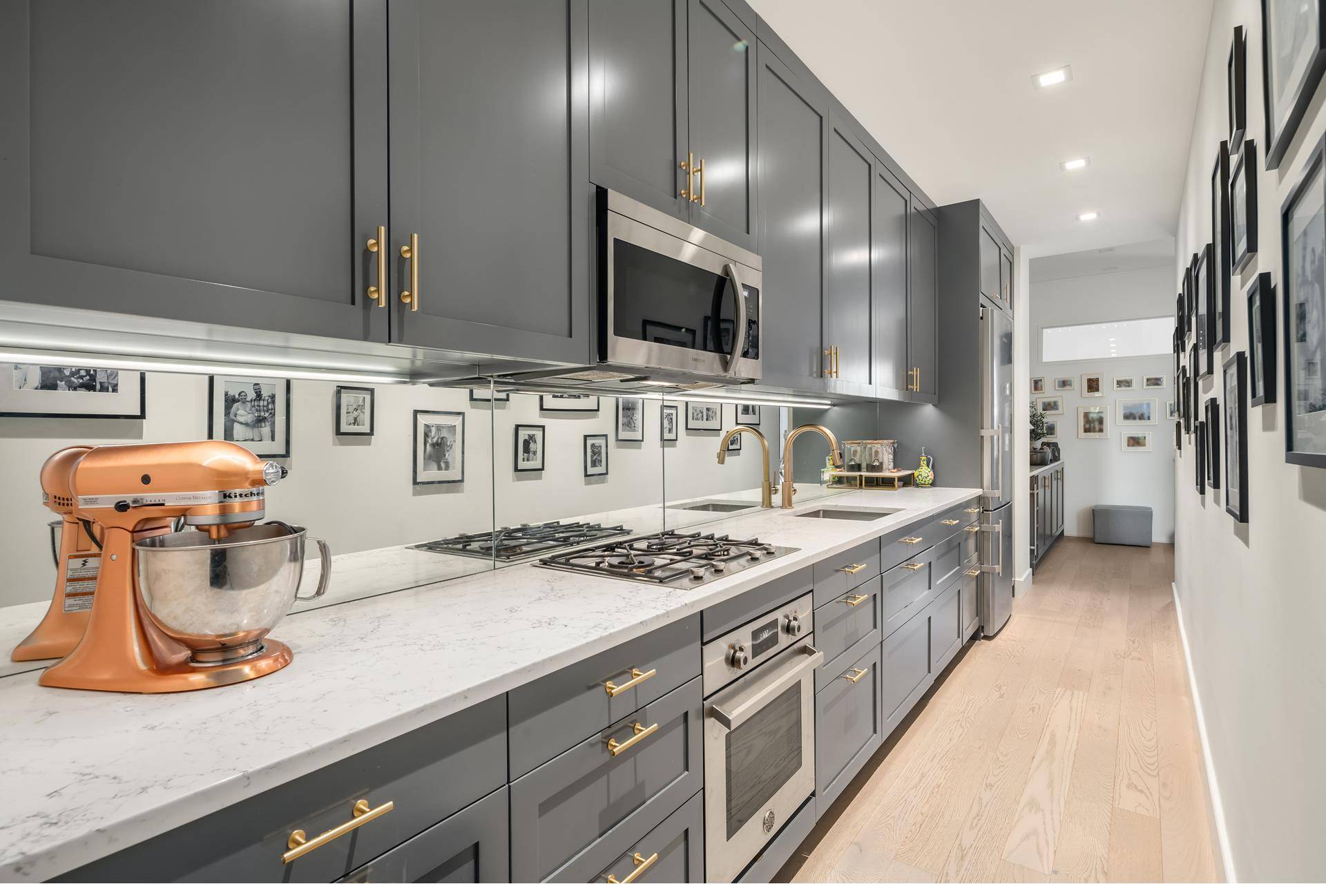 Welcome to this exquisite 20 foot wide Renaissance Revival townhouse, beautifully designed by architect Theodore F.