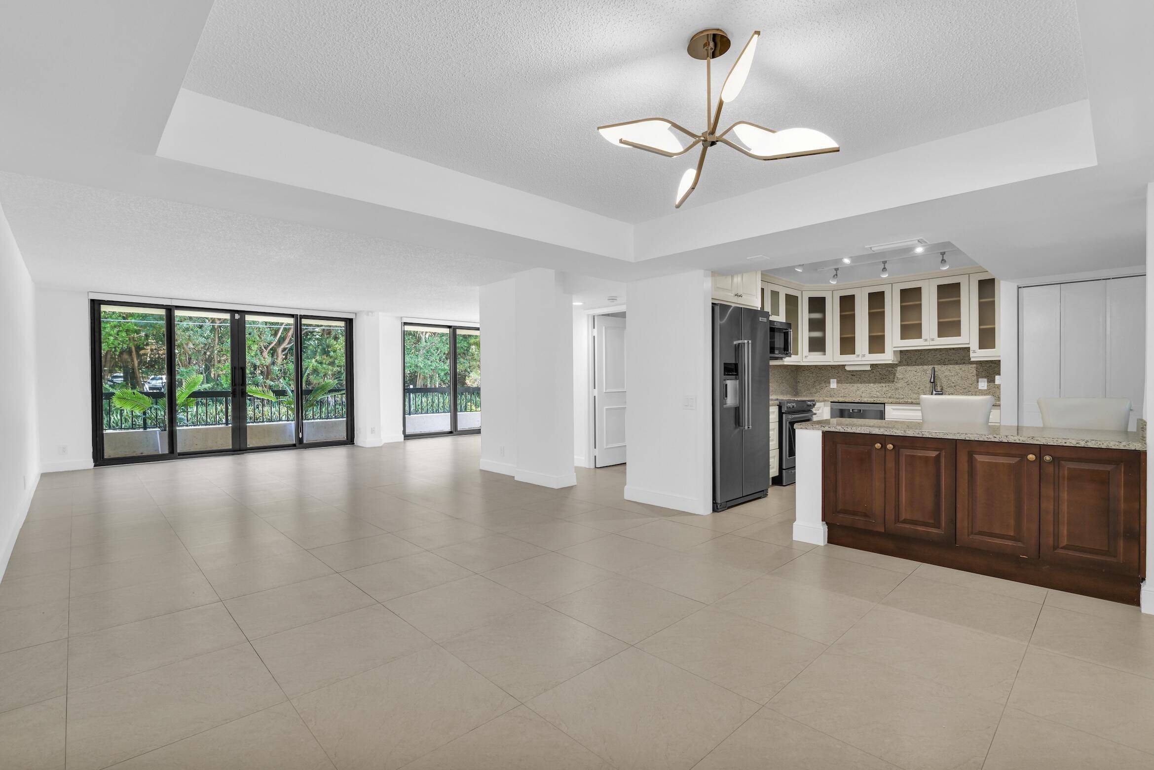 Coastal Condo in The Corniche, a Boutique 16 Unit Building Directly across from the pristine beaches and tropical mangroves of South Beach Park on A1A and 2 Blocks to Palmetto ...