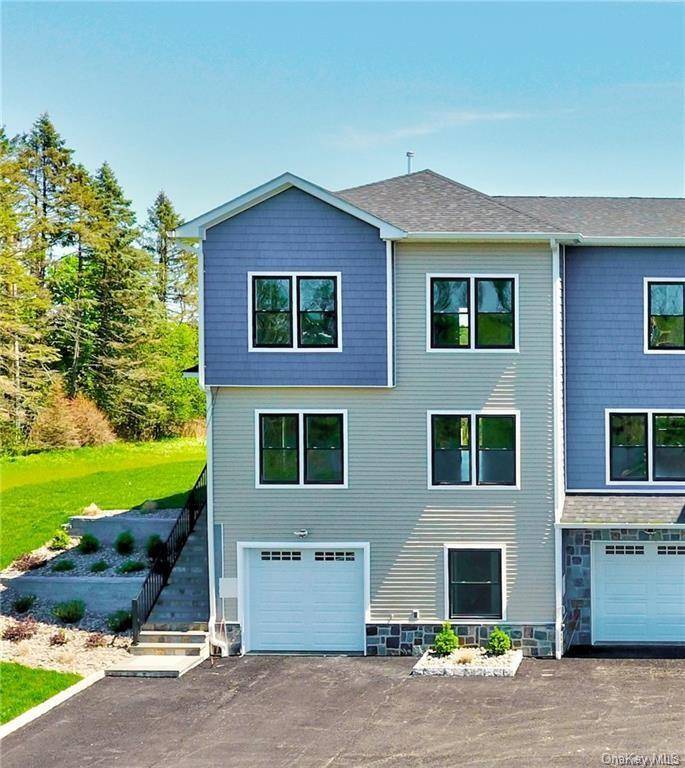 Welcome to this luxurious townhouse nestled within the exclusive community of Goshen, offering captivating 360 degree meadow vistas.
