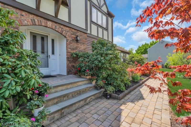 Beautifully updated and thoughtfully designed, this 5 bedroom, 2.