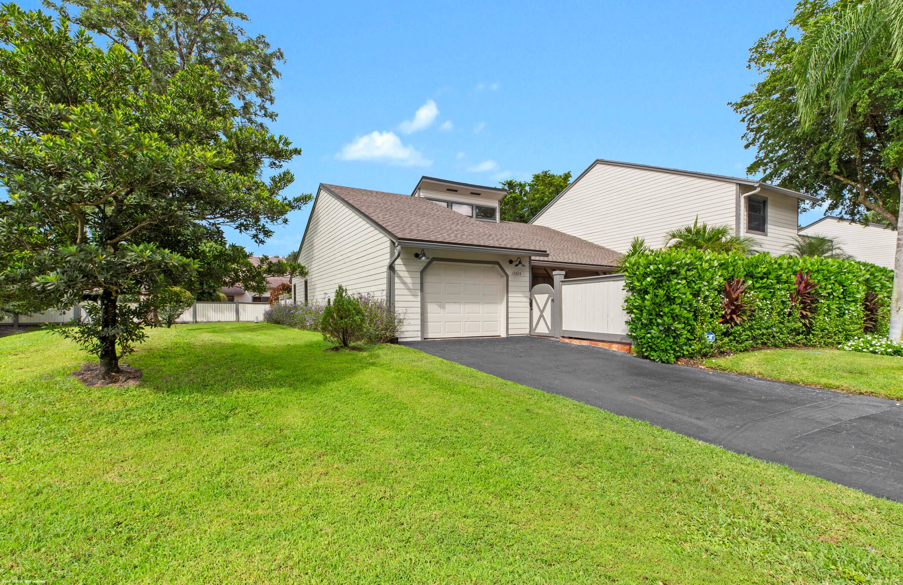 Beautifully furnished 3BR 2Bth end unit townhome with 1 car garage, updated kitchen bathrooms.