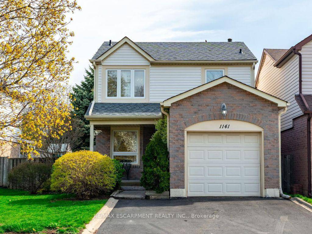 Highly desirable Glen Abbey 3 1 bedroom, 2 bathroom full 2 storey home offering the perfect blend of space, warmth, and location.