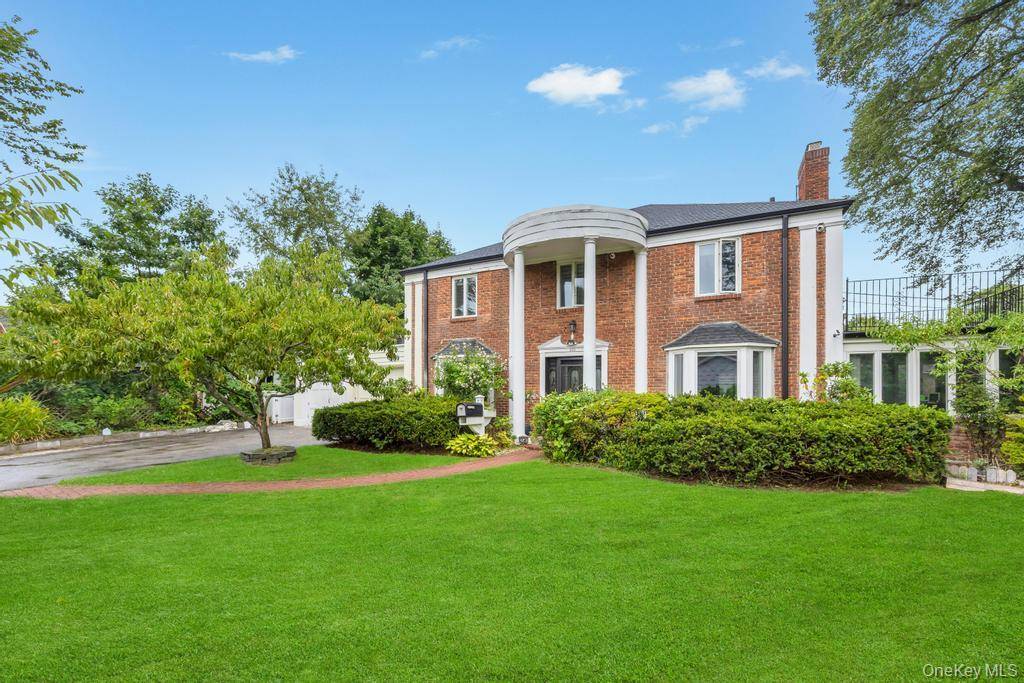 Welcome To This Totally Renovated 4 Bedroom Brick Center Hall Colonial Perfectly Positioned On A 125x100 Oversized Lot With Desirable South Facing Exposure.