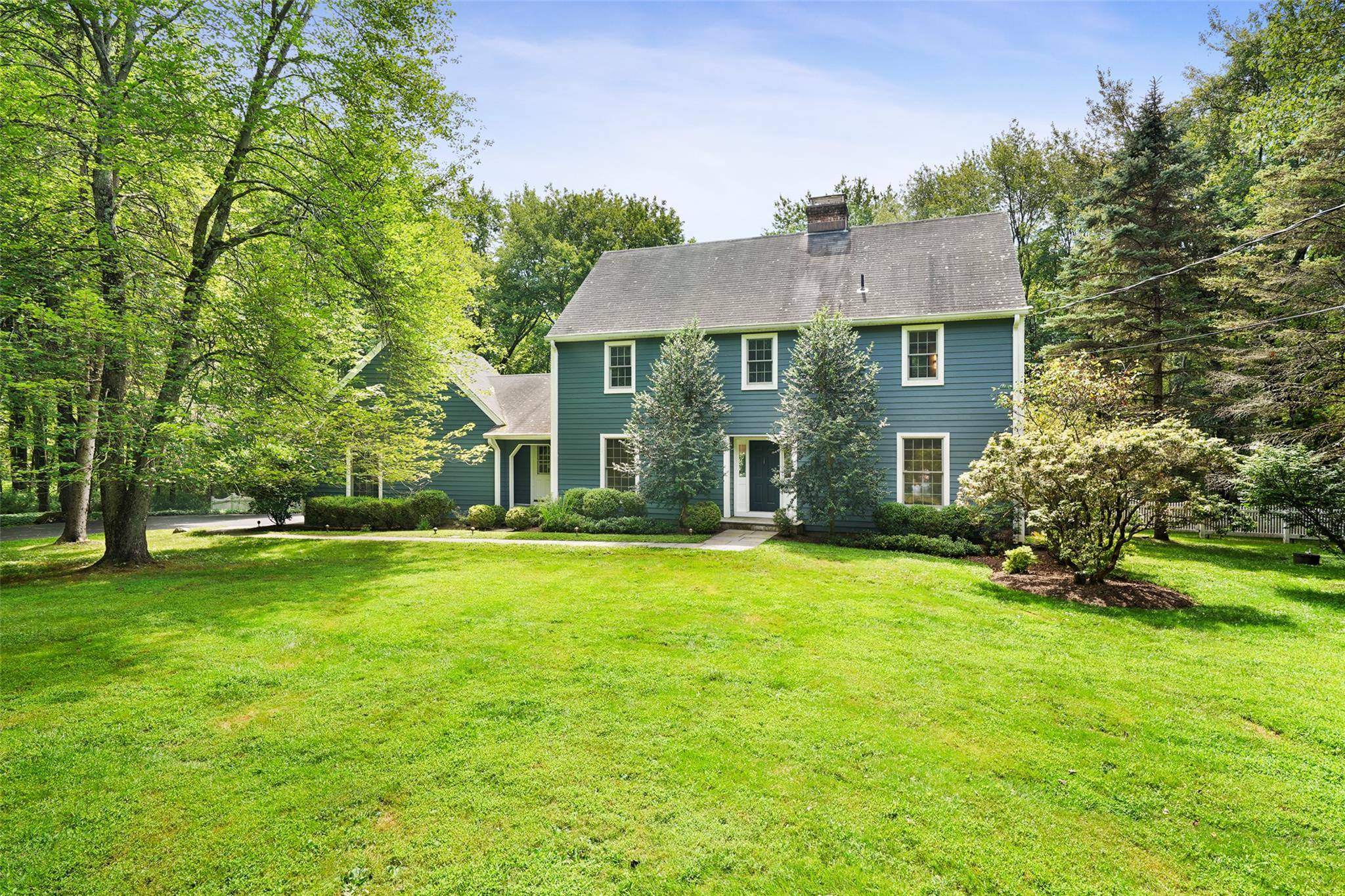 Classic Colonial on 2 Perfectly Level and Gorgeous Acres, Boarded by Old Stone Walls At The End Of The Cul De Sac.
