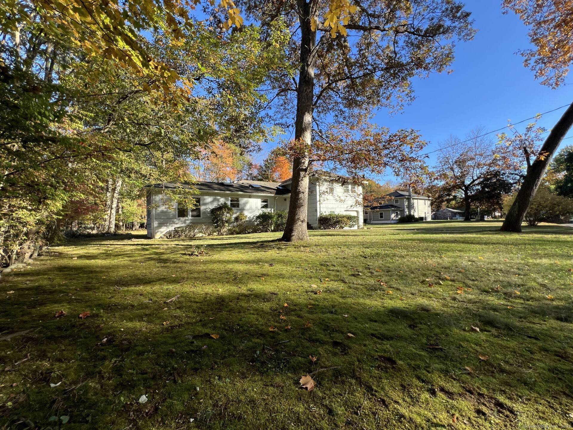 One of a kind opportunity to transform this lost 1950s Split Level residence squirreled away at the very end on Putter Drive.