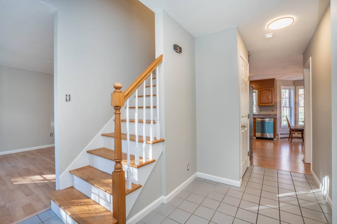 Welcome to this charming home featuring an open floor plan, freshly painted interiors, and stunning cathedral ceilings that create an expansive feel.