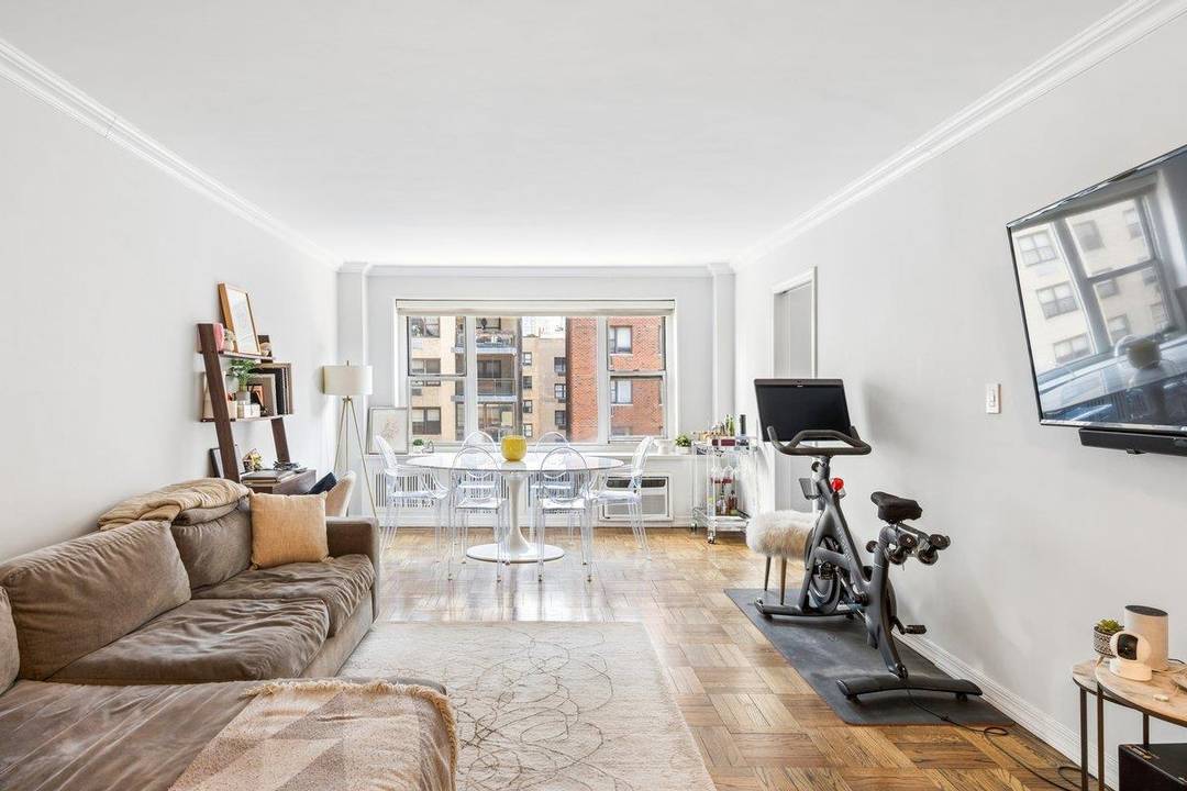 Set on a high floor of a full service doorman co op on the Upper East Side, Apartment 9C offers generous proportions, excellent storage, and open outlooks over 79th Street.
