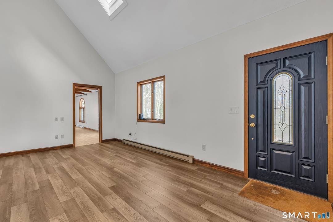 Set on over two private acres in Stafford, this 4 bedroom, 3 bath Contemporary Cape Cod offers an open floor plan designed for both comfort and function.