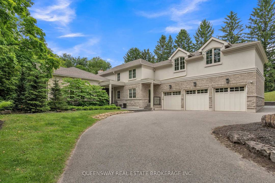 Discover unparalleled luxury in this exquisite custom built home, nestled on a beautiful private lot.