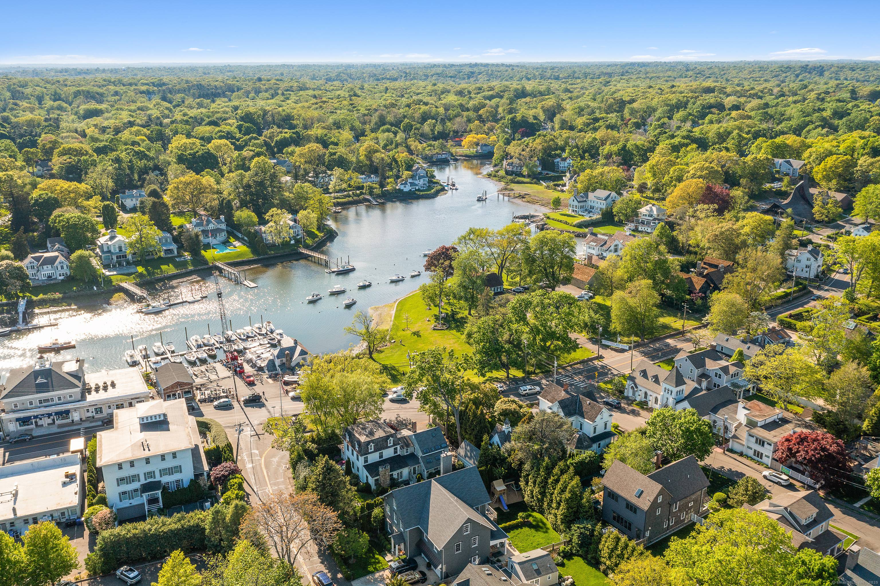 Charming Rowayton Townhouse Nestled in the heart of Rowayton, this fully renovated townhouse offers the perfect blend of modern comfort and coastal village charm.