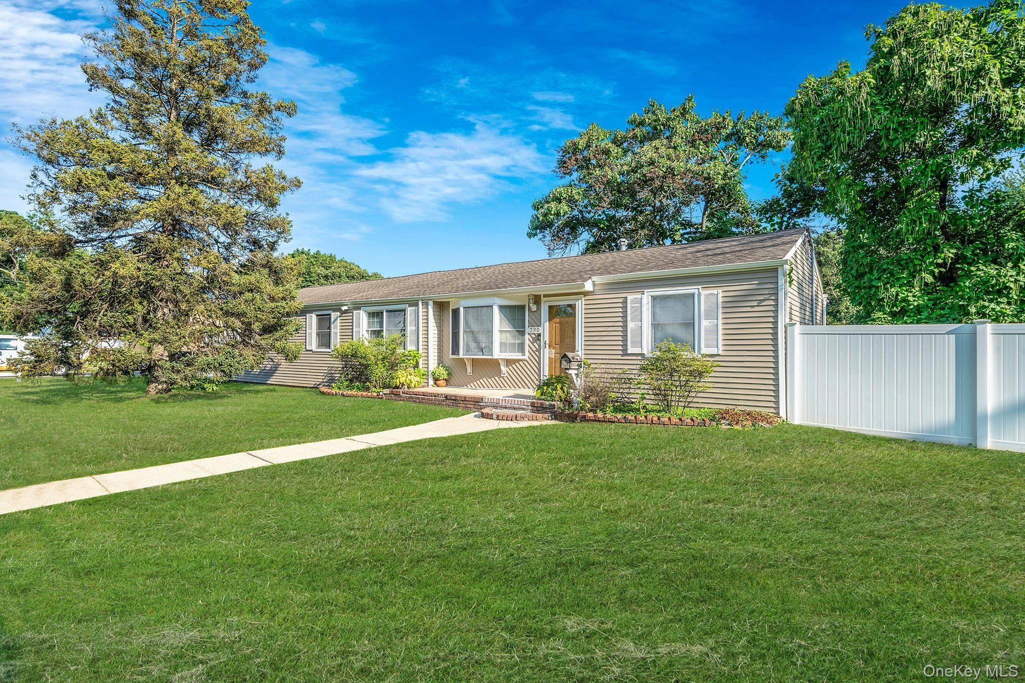 Spacious Ranch on a Corner Lot with a Fireplace You ll Love !