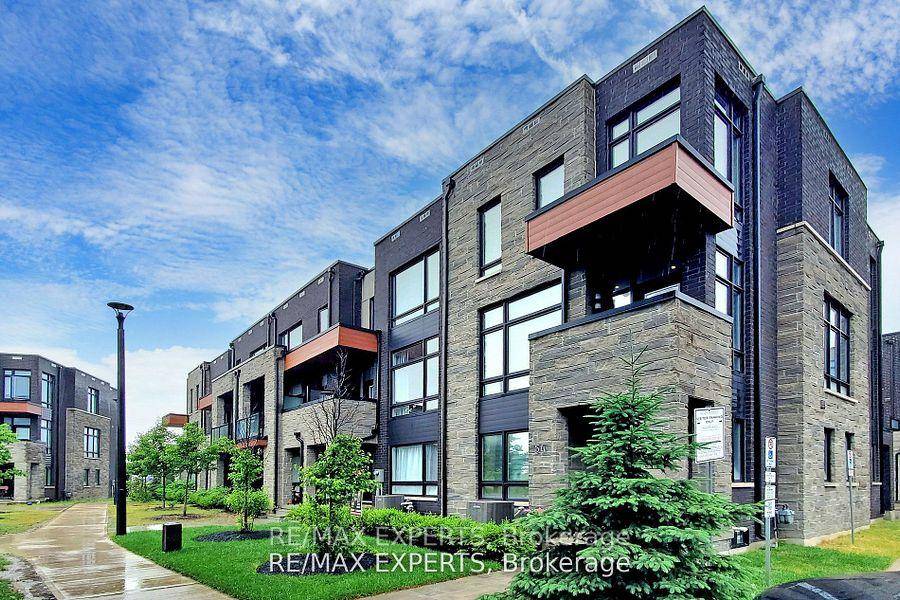 Exceptionally RARE 4 BEDROOM, 2 CAR GARAGE, END UNIT masterpiece nestled in sought after Vellore village !