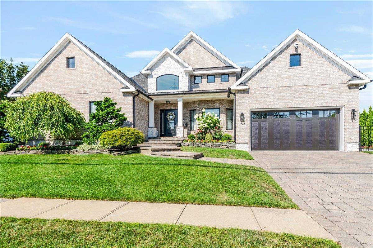 A Bold Expression of Waterfront Luxury, Designed to captivate and crafted to perfection, this custom waterfront showpiece delivers an unmatched lifestyle.