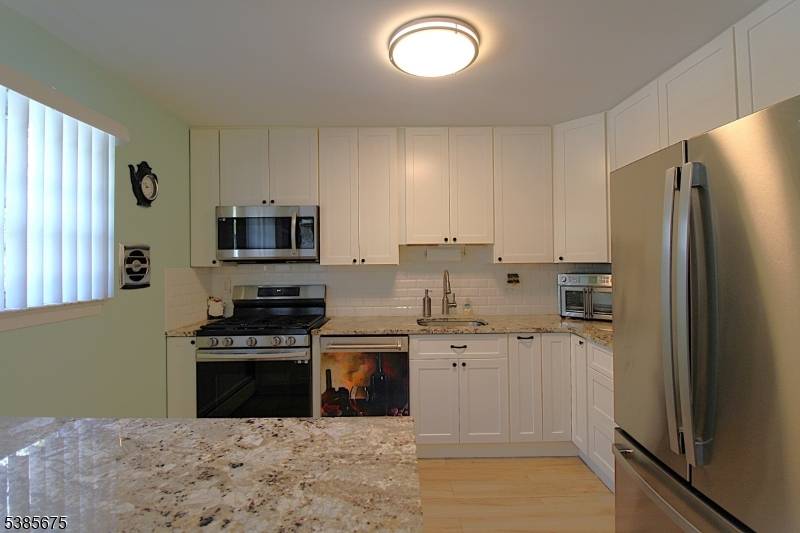Welcome to this beautifully updated 1 bedroom, 1 bath condo offering approximately 900 sq.