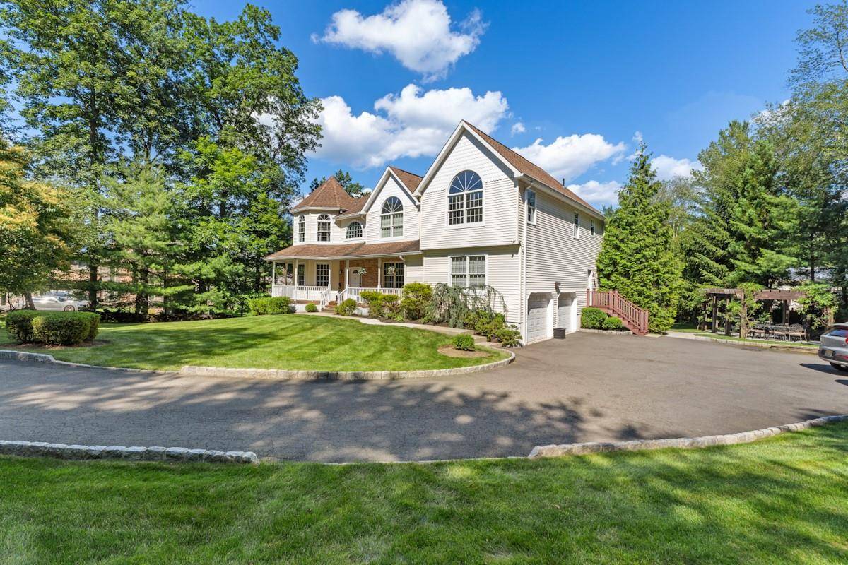 Welcome to 9 Ronwood Rd the crown jewel of Chestnut Ridge !