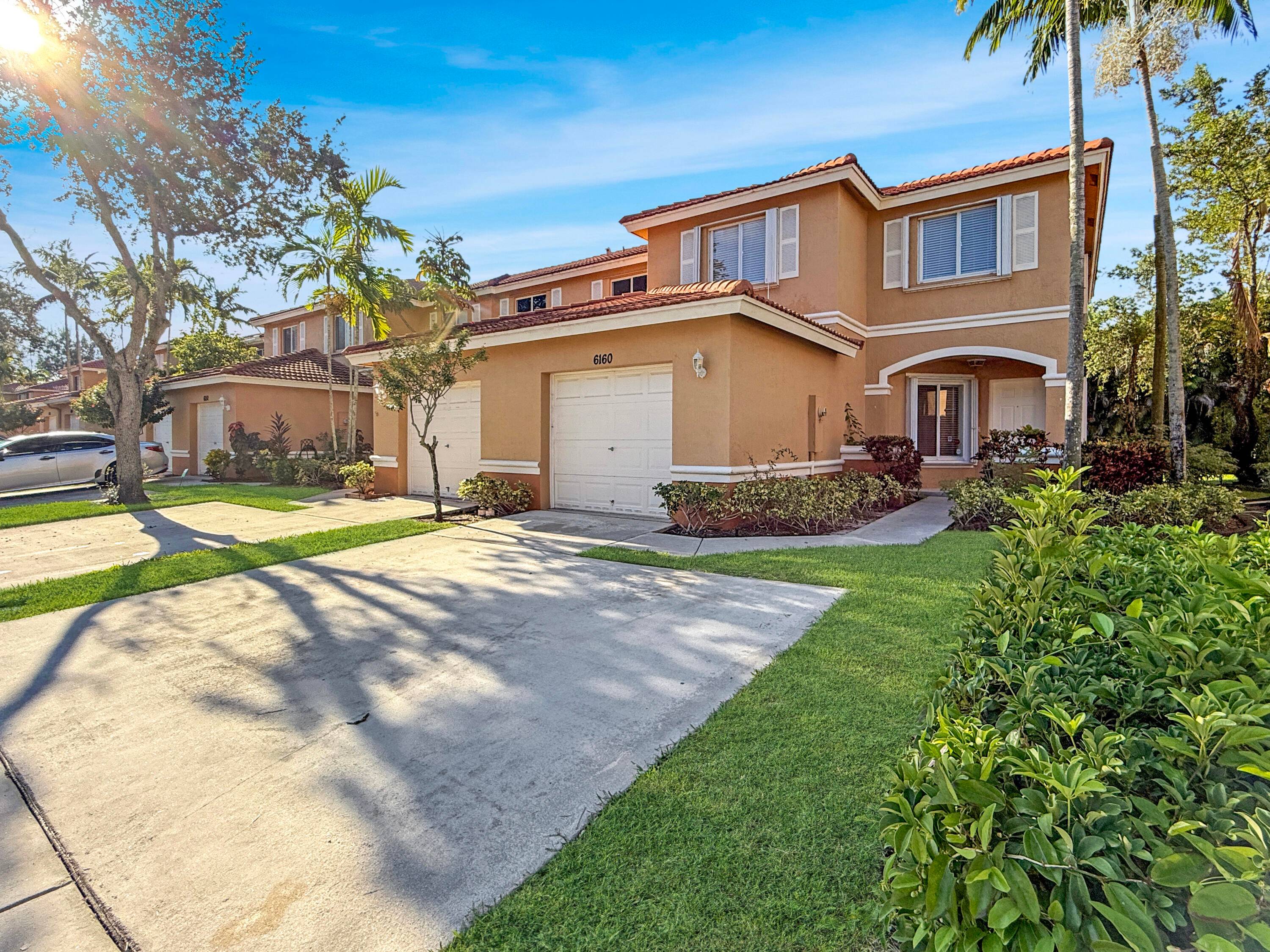 Welcome to 6160 Sugar Loaf Lane in the desirable gated community of Briar Bay.