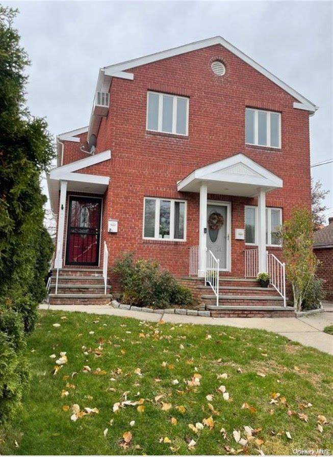Detached brick two family home in prime North Flushing.