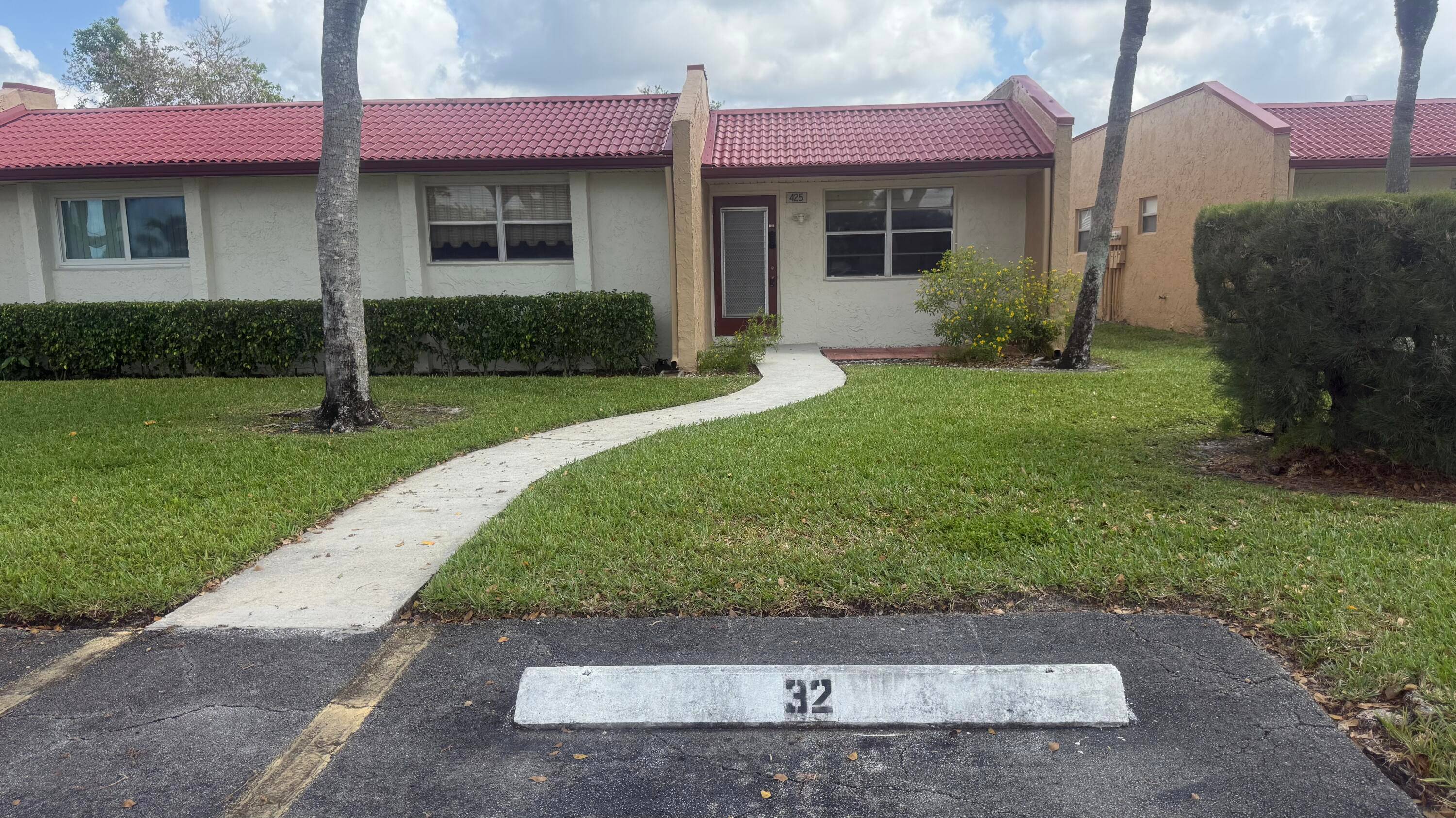 This is a corner villa directly in front of the satellite pool on a very popular street in Phase A.