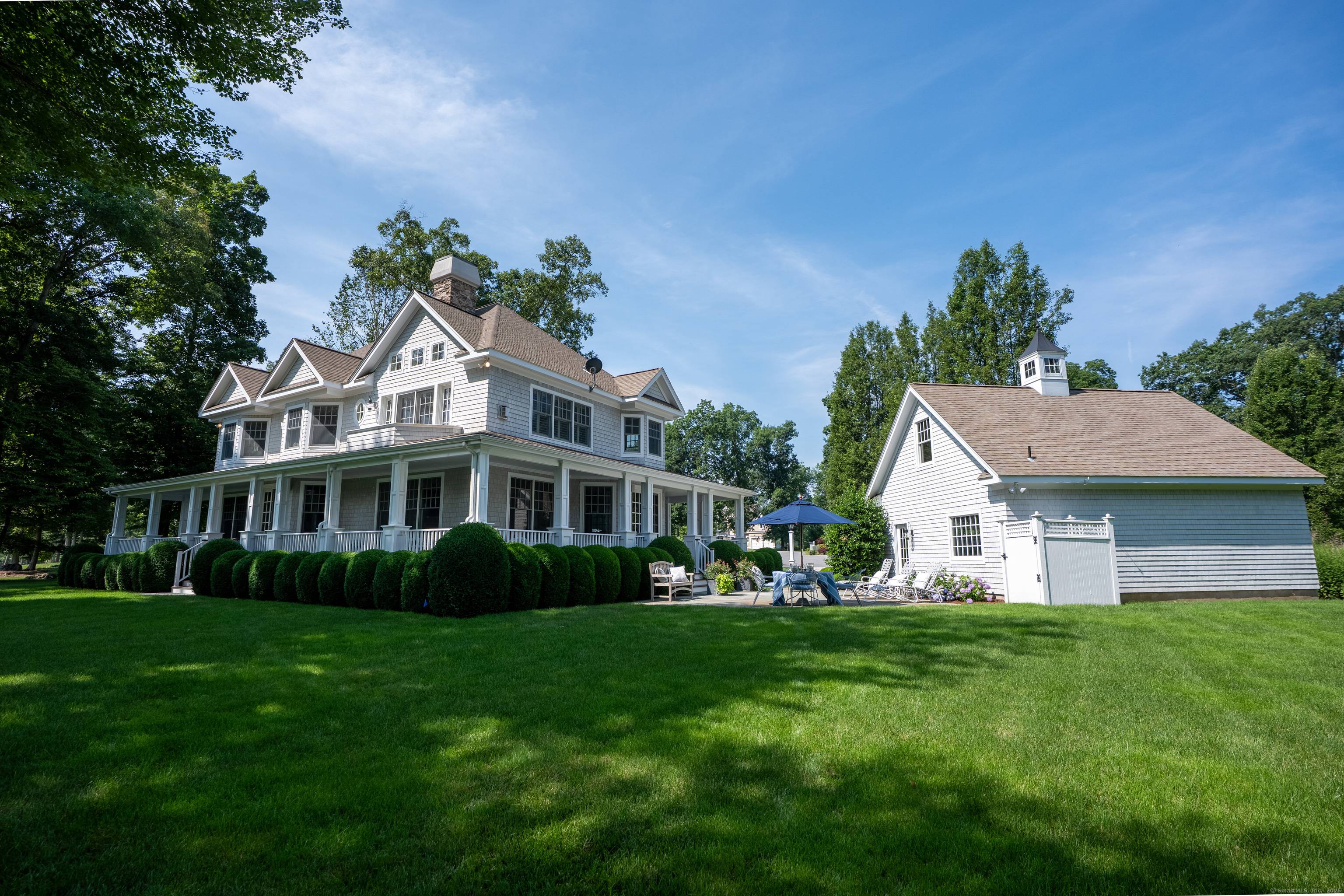 Prominently set along the 13th Fairway of the prestigious Fox Hopyard Golf Country Club, this architecturally significant Nantucket style Colonial offers the ultimate in gracious, turn key living.