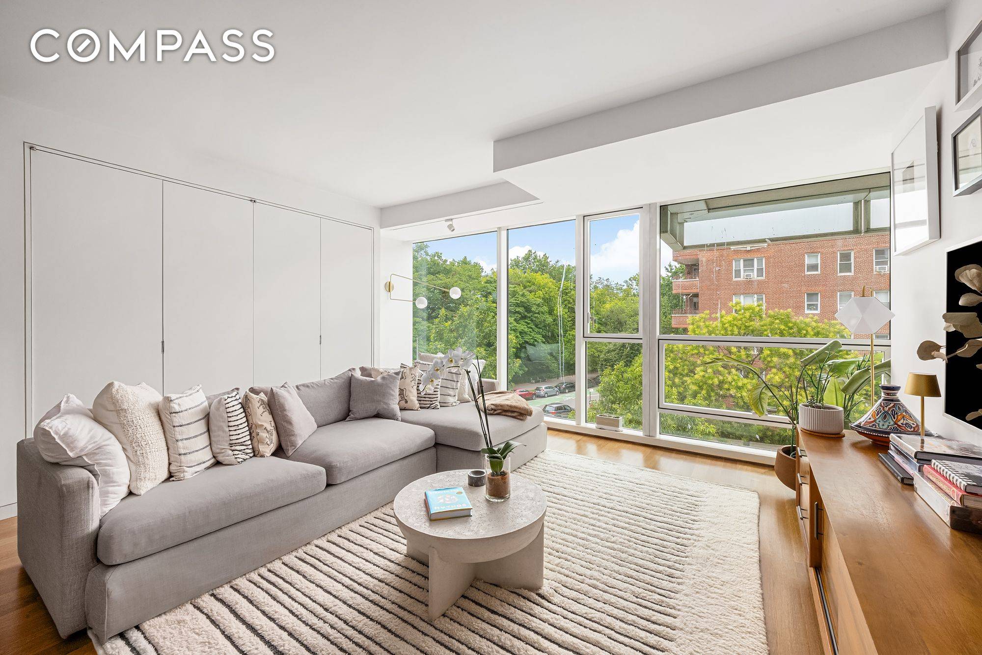 Iconic Richard Meier Glass Tower Overlooking Prospect Park and the Historic Plaza Rare Two Bedroom Residence.