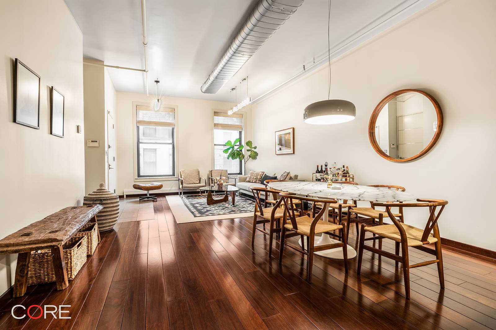 Located on one of the most coveted cobblestone streets in Tribeca, this loft is currently configured as a three bedroom, two bathroom home, with a formal dining area, living room, ...